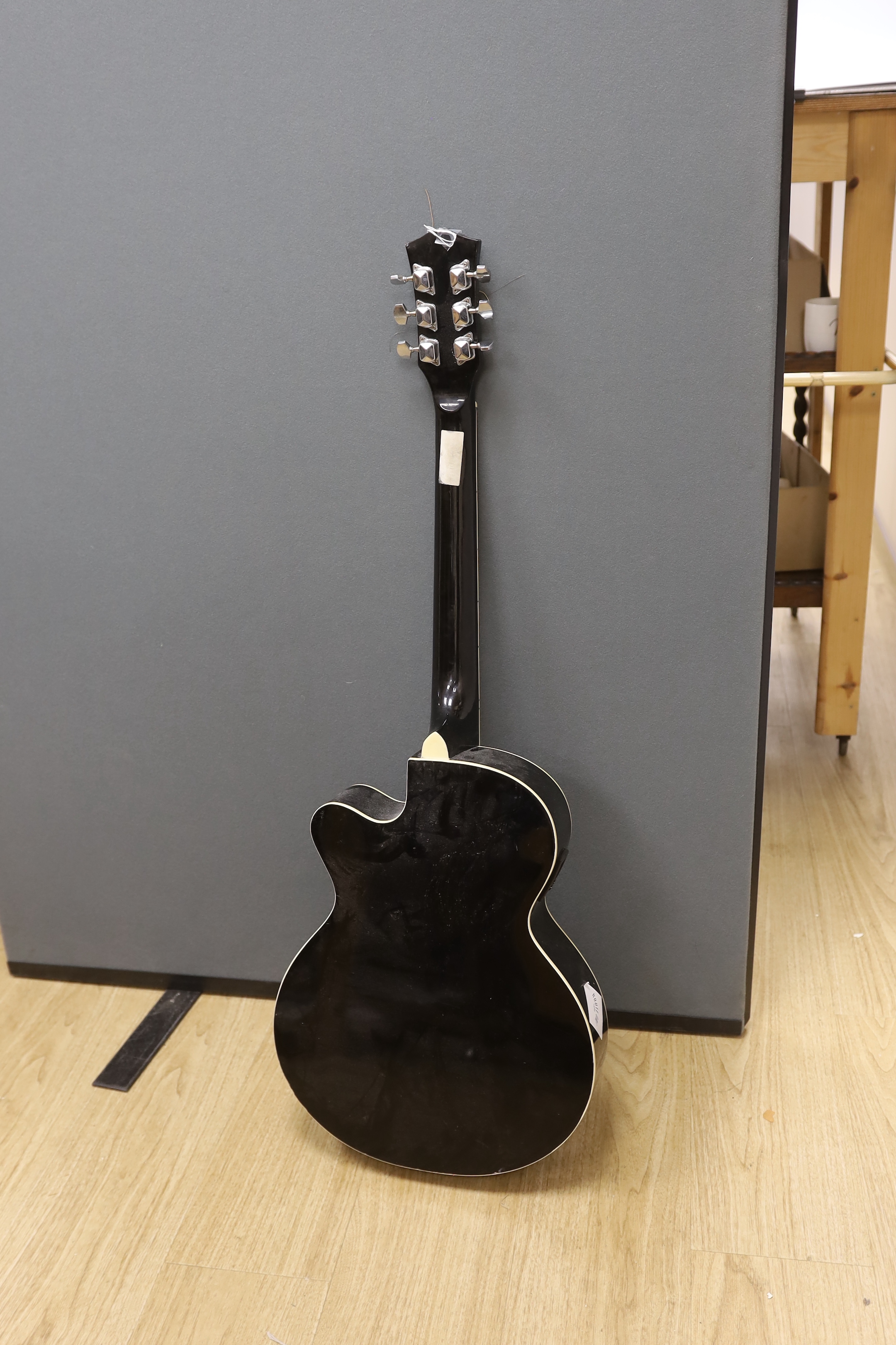 A Paragon electro-acoustic guitar